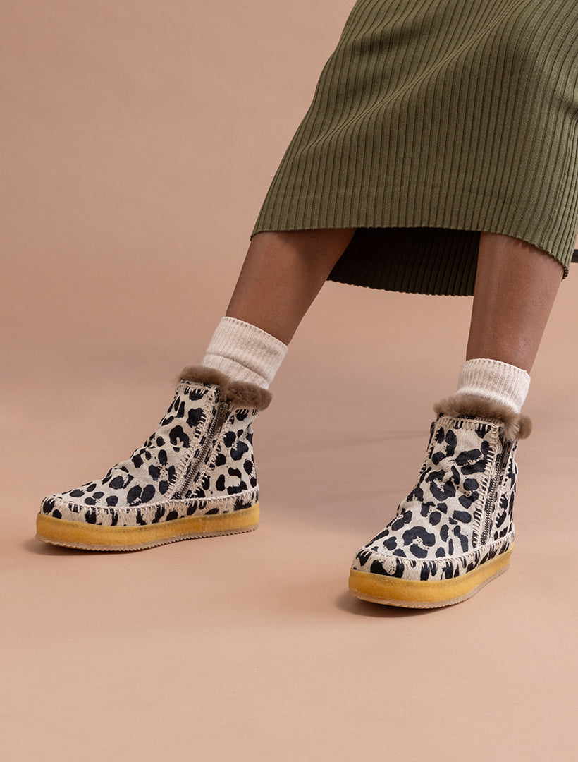 Black and 2024 white leopard boots