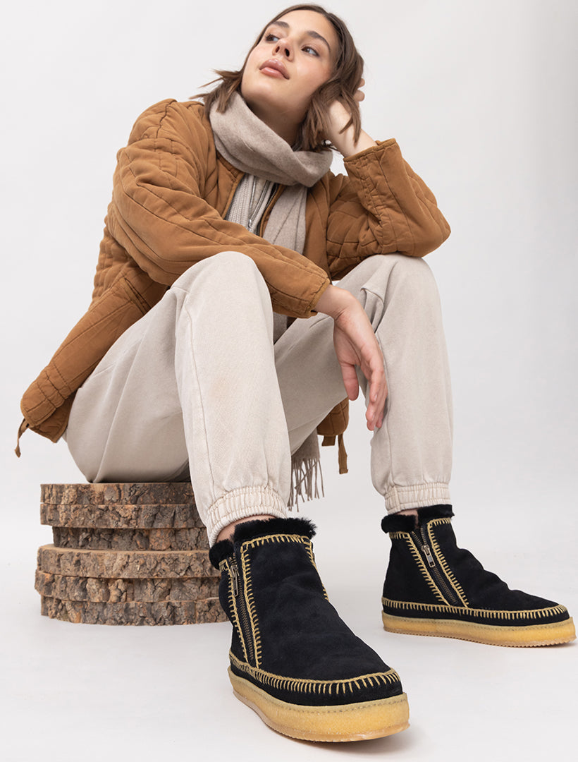 Black suede ankle boots with latte crochet