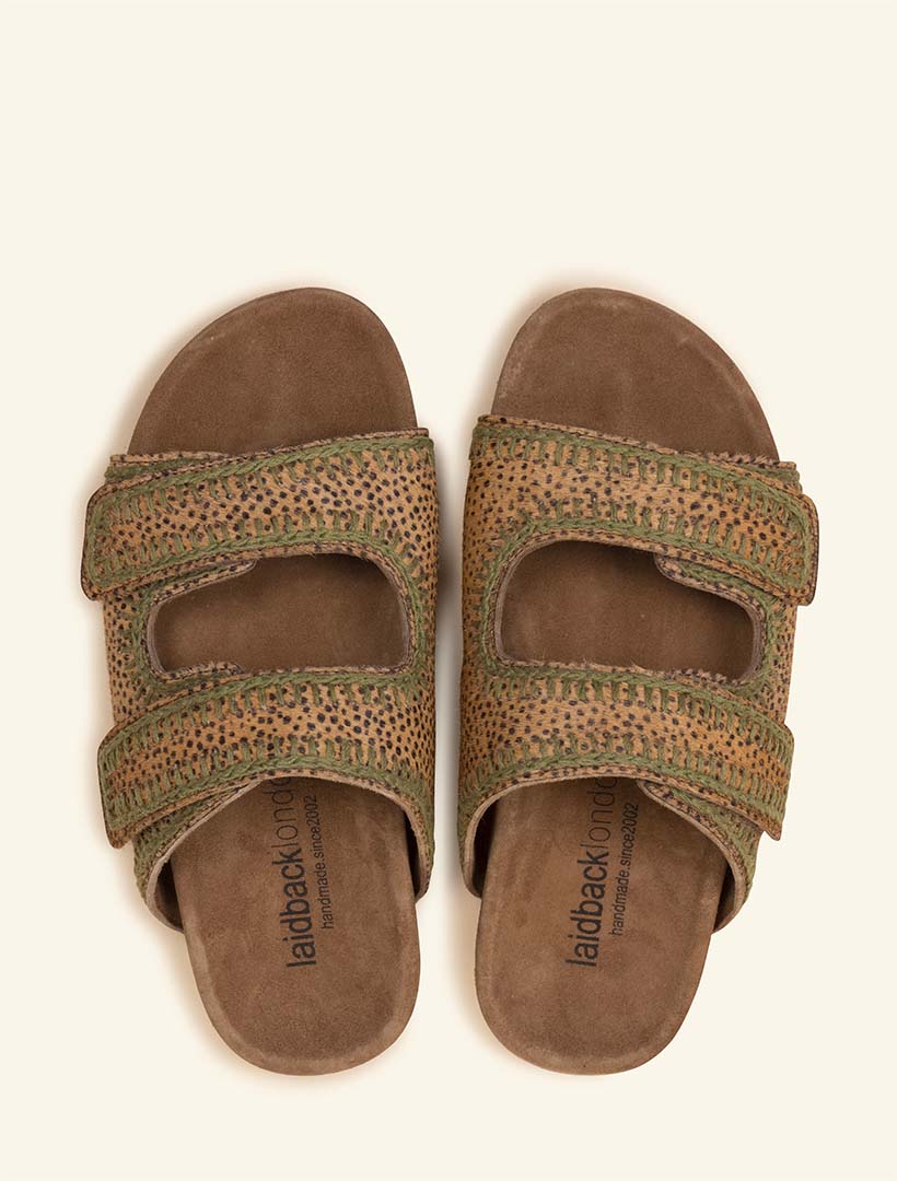 Classic slide sandals featuring double adjustable straps with contoured footbed featuring our signature army green crochet stitching.Classic slide sandals featuring double adjustable straps with contoured footbed featuring our signature army green crochet stitching.