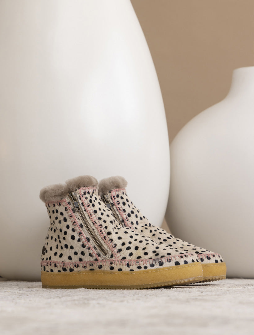 Classic handmade side zip cheetah suede ankle boots with crochet detailing in rose.
